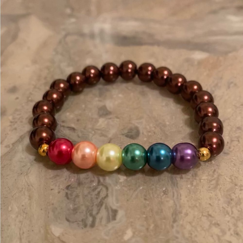 6 3/4 -7” wrist. Rainbow glass PRIDE brown bracelet: Double glued in bead knot.